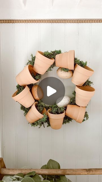 Krystal Nohai on Instagram: "DIY Terracotta Pot Wreath! 🪴  Guys!! I made this adorable terracotta pot wreath for under $8!!! I got all the items from the @dollartree!  I got one foam flower wreath, 3 packs of 3 small terracotta pots, 2 packs of reindeer moss & 1 pack of flower wire!   First I took my hot glue gun and put the pots where I wanted them on the wreath! Facing different directions! Then I used flower wire to tie them to the wreath, looping through the hole on the bottom! Next I added moss around the exposed foam and inside some of the pots! I added some neutral colored eggs to the inside! Then I used a zip tie to hang on a hook! So easy & it is so cute!! What do you think?!!  . . . . Don’t forget to like, save and follow @our.nohai.home for more!  . . . . #rusticfarmhouse #diyh Pot Wreath, Flower Wire, Small Terracotta Pots, Foam Flower, Colored Eggs, Reindeer Moss, Terracotta Pot, Foam Flowers, Instagram Diy