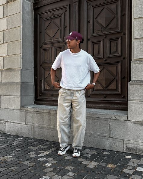 baggy jeans with cropped tees >> would you wear ? Outfit details: Cap: @47 Shirt: @asos_man Jeans: @evenandodd_official Shoes: @converse . #outfitinspo #outfitinspiration #cozystreetstyle #snobshots #simplefits #nclgallery #pauseshots #verbandbotanischergarten #classyvision #backtominimal #minimalism #lessiswore #minimalhouse1 #allstreetwear #303unknOwn #ootd #set 14 #inweekday #FitsonPoint #csthelabel