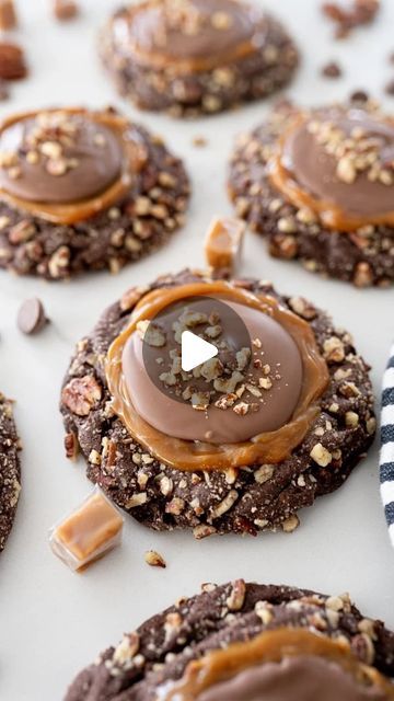 Karli on Instagram: "The most decadent, chewy chocolate cookie, smothered in caramel and chocolate and sprinkled with extra pecans. These Copycat Cr**bl  Turtle cookies are next level and absolutely amazing!🤤

Get the full recipe by searching ‘turtle cookie’ using the link in my bio!

#cookies #turtle #chocolatecookies #caramel #foodies #foodblogfeed #copycat #dupe" Chewy Chocolate Cookies, Turtle Cookies, Pecans, Chocolate Cookies, Chocolate Cookie, Next Level, Food Blog, Sprinkles, Caramel