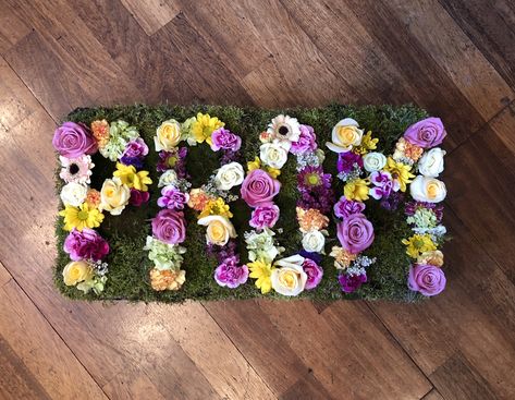 Promposal flowers: live flowers in oasis with moss background Prom Proposal Flowers, Prom Proposal With Flowers, Promposal With Flowers, Promposal Ideas With Flowers, Promposal Ideas Flowers, Flower Promposal Ideas, Flower Promposal, Promposal Flowers, Moss Background