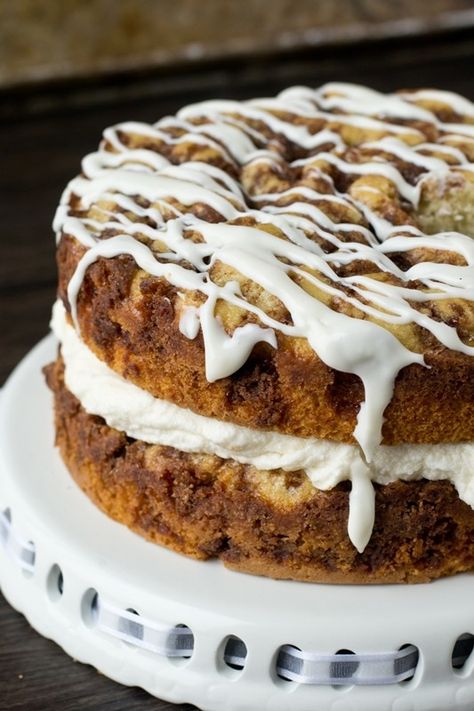 Sweet cream filling between layers of cinnamon infused coffee cake topped with a thick, vanilla glaze. Serve this cream filled coffee cake to your guests! Filled Coffee Cake, Breakfast Cake Recipes, Cinnamon Breakfast, Cinnamon Coffee Cake, Coffee Cake Recipes, Cake Tasting, Breakfast Cake, Breakfast Breads, Savoury Cake