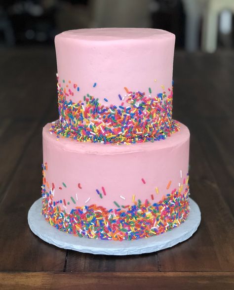 Rainbow sprinkles adorned this two-tiered white cake with pink buttercream frosting for a birthday celebration! 🥳🎉 Taste and see that the Lord is good! Thanks for allowing Cristin to serve you! 1 Tier Cake Birthday, Two Tier Sprinkle Cake, Pink Sprinkle Birthday Cake, Pink Birthday Cake With Sprinkles, Two Tier Pink Birthday Cake, Pink Birthday Cake For Girls Kids, Two Tier Cake Design, 2 Tier Pink Cake, White Cake With Sprinkles