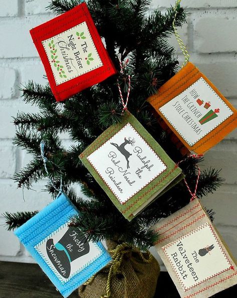 I never get tired of Christmas stories! I've created little book ornaments made from felt to display my favorite stories on my tree. Book Ornaments, Book Christmas Tree, Book Christmas, Snowman Christmas Ornaments, Quilted Christmas Ornaments, Grinch Stole Christmas, Christmas Book, Christmas Books, Felt Christmas