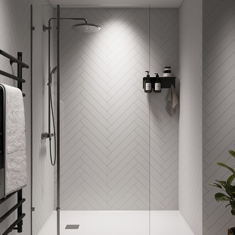 Showerwall Tile Effect Bathroom Wall Panel 2400 x 600mm - Snow White Herringbone Combining durability, timeless aesthetics, and natural charm, our fresh classic design in a contemporary matt finish will add a touch of luxury to your bathroom. Our Proclick technology ensures seamless, almost invisible joints through a mechanical locking system. Installation is a breeze with the click design, allowing panels to be quickly and easily placed without the need for joining trims. The Tile Collection pr Tile Panels Bathroom, White Vertical Tile Bathroom, Tile Effect Wall Panels, Bathroom Pvc Panelling, Bathroom Panel Ideas, Bathroom Panels Waterproof Shower Walls, Wall Panel Bathroom Ideas, Bathroom Wall Panels Ideas, Wetwall Bathroom Ideas