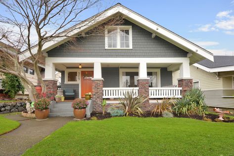 Classic American Craftsman Bungalow - built in 1912 it keeps many beautiful original details to this day: fir floors, built-ins, boxed beam ceiling, wainscot, picture rail, and a granite fireplace. Located in Tacoma's North End.  #tacomarealestate #americancraftsman #bungalow #craftsman #vintagehome #tacomawa #tacomarealtor #craftsmanforsale #greengrayhouse #frontporch #tacomarealestateagent Old Craftsman House Plans, Small Craftsman House Plans, Bungalow Classic, Types Of Houses Styles, Craftsman Bungalow Exterior, Craftsman Bungalow, Bungalow Exterior, Craftsman Exterior, Plans Architecture