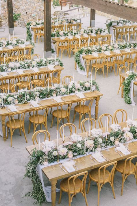 Wooden table reception with a floral table runner - Sorry, we cant talk right now--we're too busy swooning over these gorgeous photos from Nicole and Fils intimate wedding in Greece! From starting the day relaxing with matching hats and inflatable swans to ending with dinner and dancing surrounded by amazing views from Lazarou Beach Restaurant, we are obsessed with every detail from this destination wedding. Take a look so you can get lost in the magic with us! Wedding Reception Tables Layout, Wedding Table Layouts, Long Table Wedding, Wedding Reception Seating, Reception Seating, Floral Table Runner, Table Runners Wedding, Greece Wedding, Wedding Decor Inspiration