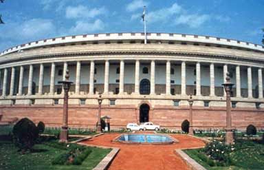 Located at the end of the Parliament Street, Parliament House is also known as Sansad Bhawan. It is a magnificent circular colonnaded structure where the representatives of Indian democracy meet. Parliament House is the office of the world’s largest democracy where the future course of the country is discussed and debated. Parliament Of India, Delhi Tourism, Pension Fund, Amazing Buildings, India Tour, Houses Of Parliament, Tourist Places, Wildlife Conservation, Editing Background