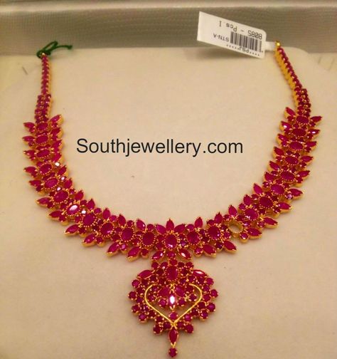 22 carat gold ruby necklace with pendant studded with rubies of different shapes from Premraj Shantilal Jewellers. For price inquiries contact on Whatsapp: +91 97 00 009000 Ruby Necklace Designs, Gold Ruby Necklace, Ruby Jewelry Necklaces, Beautiful Diamond Necklace, Gold Jewelry Simple Necklace, Beautiful Gold Necklaces, Red Stones, Gold Necklace Indian Bridal Jewelry, Diamond Necklace Designs