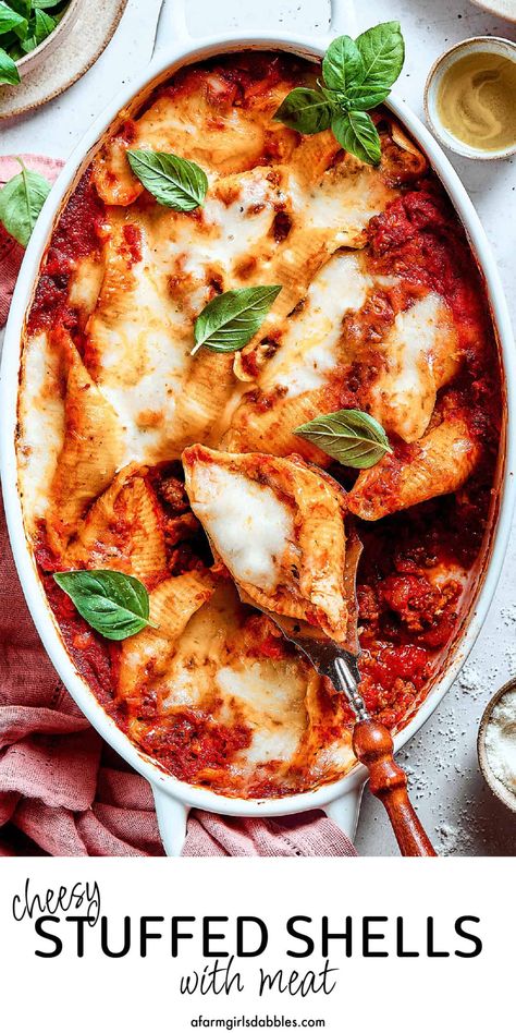 This cozy Stuffed Shells with Meat recipe is packed with flavor. Featuring pasta, ground beef, marinara, pesto, and plenty of melty, gooey cheese - this hearty comfort dish is a family favorite. It's a great make-ahead option for busy nights and entertaining, and it makes the best leftovers! Shells Pasta Recipes, Beef Stuffed Shells, Best Leftovers, Pasta Ground Beef, Stuffed Shells With Meat, Italian Main Dishes, Shell Pasta Recipes, Fall Eats, Stuffed Shells Ricotta