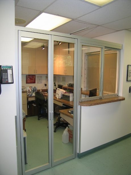 School Admin Office Swing Doors & Reception Window  #officedivider #glassbarndoor #interiorslidingdoor Reception Window, Radio Active, Glass Barn Doors Interior, Glass Wall Office, Portfolio Designs, Glass Office Partitions, Waiting Room Design, Door Solutions, Projects School