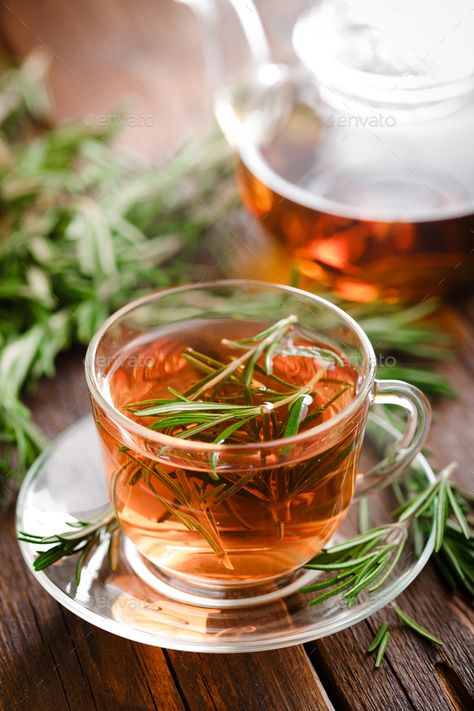 Rosemary tea in glass tea cup on rustic wooden table closeup. Herbal vitamin tea. by sea_wave. Rosemary tea in glass tea cup on rustic wooden table closeup. Herbal vitamin tea.#cup, #rustic, #glass, #Rosemary Herbal Tea Photography, Herbal Vitamins, Rosemary Tea, Herbal Teas Recipes, Rustic Wooden Table, Glass Tea Cups, Sea Wave, Hot Toddy, Design Painting