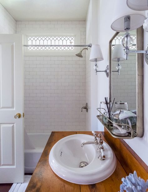 Beautifully Renovated New England Cottage on Cape Cod | Town & Country Living White Vintage Bathroom, Cape Cod House Interior Ideas, Cape Cod Town, Cottage Showers, England Cottage, 1960s Home Remodel, New England Cottage, Cape Cod Cottage, Brick Cottage