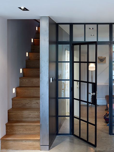 nice stair lighting....love casement door/wall    Stiff-and-Trevillion-remodel-West-London-Victorian-industrial-kitchen-steel-framed-doors Crittal Doors, Steel Frame Doors, Steel Windows, Wooden Stairs, Wood Stairs, 아파트 인테리어, Open Door, Design Industrial, Style At Home