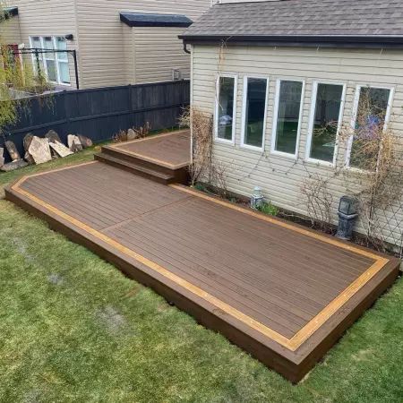 Ground Level Deck Ideas: Discover Creative Solutions for Low-to-the-Ground Homes | Decks.com Small Deck Designs Layout, Small Ground Level Deck Ideas, Deck Ideas On A Slope, Ground Level Deck Ideas, Small Deck Designs, Small Ranch House, Ground Level Deck, Tree Deck, Multi Level Deck