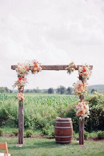 Ways to Use Wine Barrels in Your Wedding Decor ★ wine barrels simple wooden arch decorated with flowers and a wine barrel wooden weddings via instagram Wine Barrel Wedding Decor, Wedding Arbor Decorations, Barrel Wedding Decor, Diy Wedding Arbor, Wedding Trellis, Wine Barrel Wedding, Fall Wedding Arches, Barrel Wedding, Diy Wedding Arch