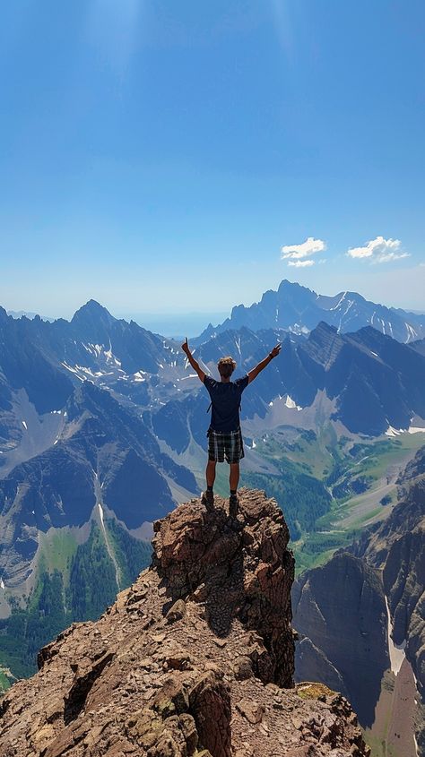 Summit Victory Pose: An exhilarating moment captured as a hiker raises arms in triumph atop a rugged mountain peak. #hiker #mountain #summit #triumphant #achievement #adventure #arms #raised #aiart #aiphoto #stockcake https://ayr.app/l/6DAJ Triumphant Pose, Mountain Summit, Instagram Wall, Victory Pose, American Holidays, Vision Board Manifestation, Spring 2025, Mountain Peak, Clear Blue Sky