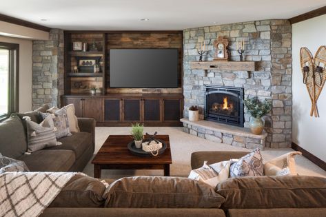 Corner Fireplace Basement Layout, Mantle Corner Fireplace, Corner Fireplace With Tv On Side Wall, Corner Fireplace With Storage, Corner Fireplace Basement, Basement Corner Fireplace, Corner Fireplace Tv Wall, Corner Fireplace Living Room With Tv, Corner Fireplace With Built Ins