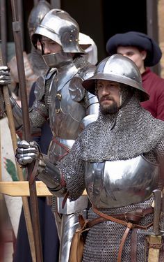 The man in the front is wearing plate and mail armor with a kettle helmet (more pikeman-like armor) and the man in the back is wearing a full set of plate armor with a sallet helmet. 15th Century Armor, Plate Armor, Century Armor, Armor Clothing, Historical Armor, Late Middle Ages, Medieval Life, Medieval World, Knight Armor