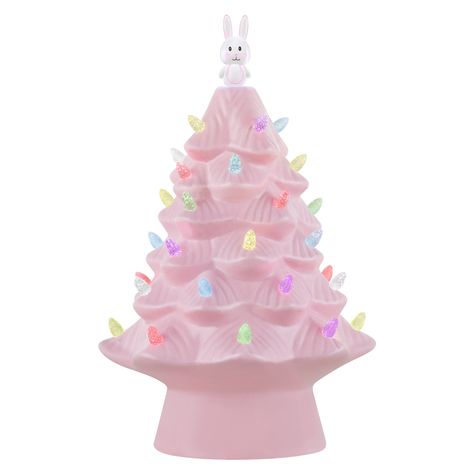 "Purchase Mr. Cottontail Pink 13\" Ceramic Easter Bunny Tree at Michaels. com. 13\" Nostalgic Easter Bunny Tree from Mr. Cottontail. Ceramic tree with pink polished finish. LED illuminated with pastel multi-colored bulbs and a Easter bunny topper. Adapter-operated with a timer. Your favorite vintage Christmas decoration just got an Easter makeover. This 13\" Nostalgic Easter Tree with LED lights by Mr. Cottontail is sure to be a new seasonal favorite with its vintage style and old-fashioned char Tree Table Decor, Ceramic Easter, Bunny Pink, Mr Christmas, Pink Tree, Glossier Pink, Tree Table, Miniature Trees, Pink Trees