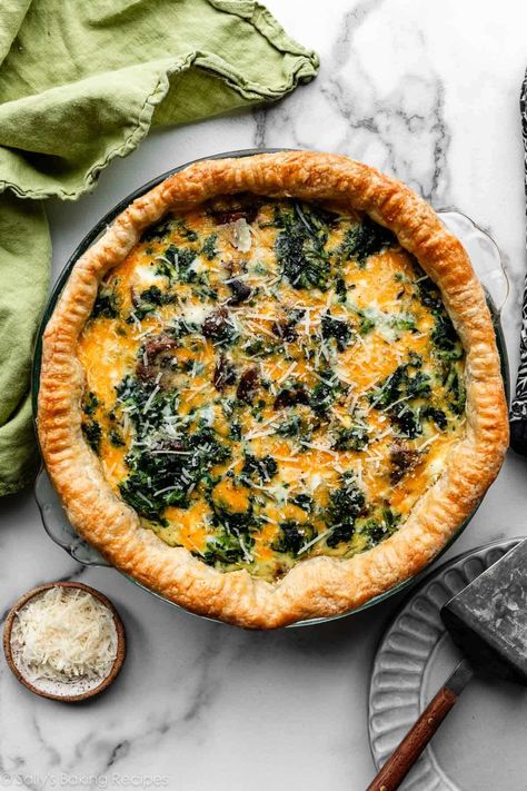 Using my favorite quiche recipe as the starting point, this cheddar cheesy spinach quiche is a savory, creamy, and satisfying option for brunch, lunch, or dinner. As good as the savory egg-custard filling is, it somehow becomes even BETTER paired with a buttery flaky pie crust! This one is always a crowd pleaser. sallysbakingaddiction.com Brunch Meals, Spinach Pies, Vegetarian Lunches, Spring Dinners, Buttery Flaky Pie Crust, Spinach Quiche Recipes, Delicious Quiche, Cheesy Spinach, Thanksgiving Breakfast