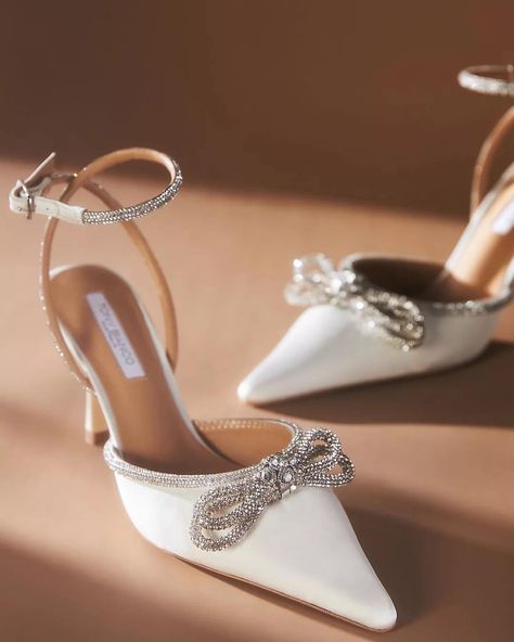 roundup: the classiest and most timeless silhouette option for your wedding is a pointed toe heel. whether adorned with flower or bow appliqués or a simple satin/leather you cannot go wrong with this option. opt for a kitten heel height for ultimate comfort | shop all bridal accessories via link in bio 🤍 . . #shoes #weddingshoes #bridalstyle #wedding #bridetobe #weddingaccessories Pointed Wedding Shoes, Sparkly Wedding Shoes Brides, Wedding Shoes Aesthetic, Wedding Kitten Heels, White Bow Heels, Wedding Heels Brides, Graduation Vibes, Wedding Heels For Bride, Midsummer Wedding