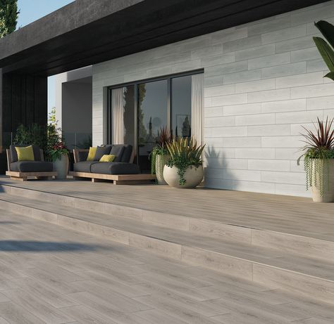 A zen-inspired design brings to mind earthy colors and soft tones that promote a calm and peaceful space.  #BelknapWhiteGroup #MarazziUSA #Zen #ZenInspired #Wood #WoodLooks #OutdoorSpaces #OutdoorDecor #OutdoorLiving #Patio Outdoor Wood Tiles, Wood Wall Tiles, Porcelain Wood Tile, Peaceful Space, Porch Tile, Exterior Wall Tiles, Exterior Tiles, Indoor Tile, Patio Tiles