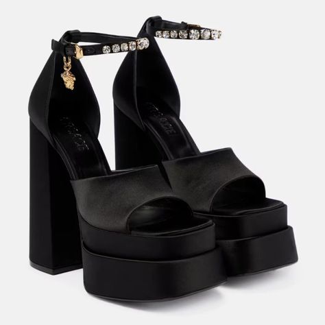 Versace Women's Medusa Aevitas Black Satin Crystal-Embellished Platform Sandals Size 38 It / 8 Us Msrp $1,475.00 Versace's Bold Sandals Are Anchored By A Towering Platformed Block Heel. Crafted Of Soft Satin In Italy, This Statement Pair Features A Dainty Ankle Strap Adorned With Lustrous Crystals And A Medusa Head Charm. Satin Upper Square Open Toe Adjustable Ankle Strap Leather Lining Leather Sole Made In Italy Single Dust Bag Satin-Covered Block Heel, 6" (155mm) Authenticity Guaranteed All Products Are Purchased From Authorized Wholesalers Or Distributors. Versace Double Platform, Versace Platform Heels Grey, Farfetch Platform Heels, Versace Medusa Platform, Versace Heels, Dr Shoes, Medusa Head, Chunky Shoes, Satin Bags