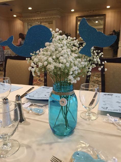 Whale Table Centerpieces, Nautical Baby Shower Centerpiece Ideas, Shark Table Centerpiece, Ocean Baby Shower Centerpieces, Under The Sea Baby Shower Centerpieces, Ocean Themed Centerpieces, Whale Baby Shower Theme Boy, Sea Life Baby Shower Ideas, Shark Baby Shower Ideas