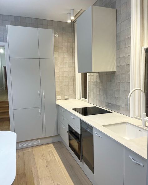 This recently completed kitchen project is compact yet stylish, making the most of the space in this terrace home. It features White Grey laminate and a sleek 20mm stone benchtop. #farquharkitchens #kitchensadelaide 20mm Stone Benchtop, Terrace Home, Stone Benchtop, Grey Laminate, Kitchen Projects, The Space, Laminate, Terrace, Kitchens