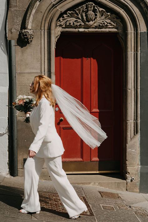 City Chambers Edinburgh wedding with bride in a trouser and jacket suit with finger tip veil Bridal Wedding Suits For Women, Bridal Suit With Veil, White Suit Bride, London Registry Office Wedding, Wedding Suits For Women, Registry Office Wedding Dress, Wedding Suit Women, Wedding Suits For Bride, Brides Veil