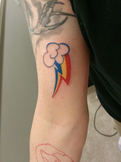 Rainbow Dash Cutie Mark Tattoo, Rainbow Dash Tattoo Ideas, Scenecore Tattoo, Mlp Cutie Mark Tattoo, My Little Pony Tattoo Cutie Mark, Mlp Tattoo Ideas, Kidcore Tattoo, Rainbow Dash Tattoo, Tattoo Ideas Celtic