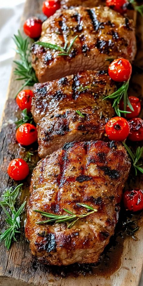 Looking for a meal that will impress your guests? Try my Juicy Grilled Pork Tenderloin! Cooked to perfection on the grill, it’s packed with flavor and paired beautifully with roasted tomatoes and fresh rosemary. This dish is not only easy to make but will bring a burst of flavor that everyone will love. Perfect for a summer BBQ or a cozy dinner at home! Grilled Pork Roast, Grilled Pork Tenderloin Recipes, Bbq Pork Tenderloin, Homemade Banana Pudding Recipe, Mustard Pork Tenderloin, Roasted Pork Tenderloin, Grilled Halibut, Pork Tenderloin Recipe, Roasted Pork Tenderloins