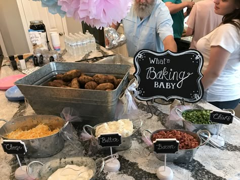 Gender Reveal "What's Baking Baby" potato bar Gender Reveal Bar, Bake Potatoes Bar Ideas, Whats Baking Gender Reveal, Finger Foods For Gender Reveal Party, Soup Bar Baby Shower Food Ideas, Fall Gender Reveal Food Ideas, Baked Potato Bar Wedding, Baked Potato Bar Ideas, Potatoes Bar