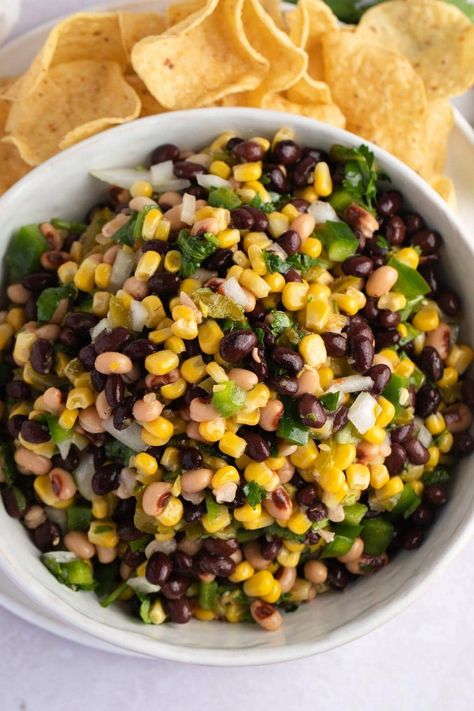 Try this cowboy caviar recipe for an experience you won't forget! Made with beans, corn, and Tex-Mex ingredients, this amazing dip is a guaranteed hit! Cowboy Caviar Recipe, Spicy Dip, Caviar Recipes, Bite Size Snacks, Cowboy Caviar, Italian Salad Dressing, Light Salad, Delicious Appetizer Recipes, Italian Salad