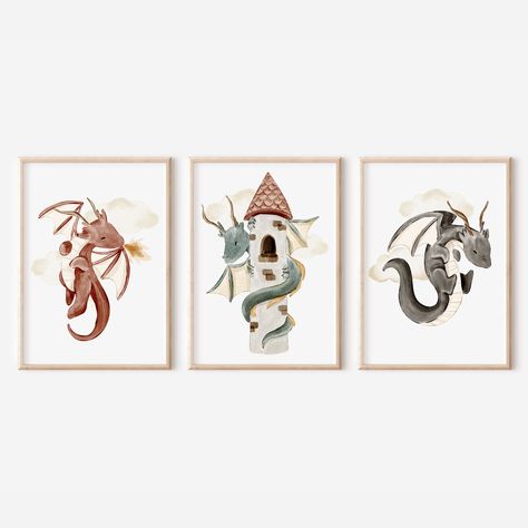 "This set of 3 dragon nursery prints are perfect for any dragon theme room. These watercolor prints feature a red fire breathing dragon flying in the clouds, a dragon wrapped around a castle tower, and an adorable black dragon flying in the clouds. Display this printable dragon wall art in a dragon boy room, dragon playroom, or a dragon girl room. Three very cute dragon posters that will bring you and your little one happiness, magical storytelling, and bright imagination. Bring a dragon fantasy Medieval Themed Nursery, Dragon Wall Decor, Nursery Fantasy Theme, Knights And Dragons Nursery Baby Boy, Dragon Nursery Girl, Dnd Nursery Theme, Fantasy Themed Nursery, Dragon Bedroom Ideas, Dragon Baby Nursery