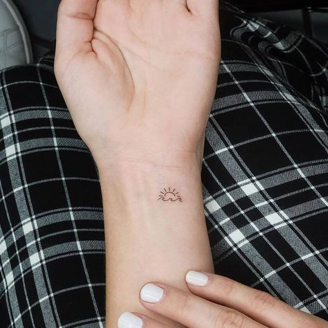 Minimalist sun and wave tattoo on the wrist. Sun Wave Tattoo, Tiny Sun Tattoo, Wrist Hand Tattoo, Wave Tattoo Wrist, Above Elbow Tattoo, Small Wave Tattoo, International Tattoo, Tiny Wrist Tattoos, Sunset Tattoos