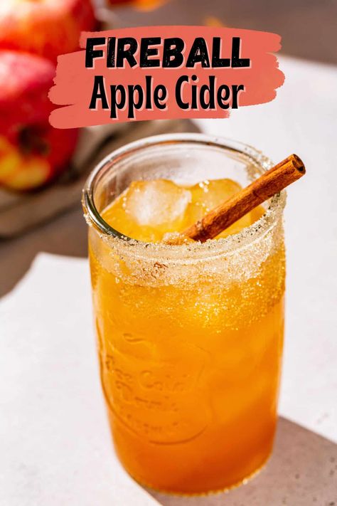 This Fireball Apple Cider is the perfect fall cocktail! Easy to make, super tasty and with the perfect apple cinnamon flavor that autumn is all about. Fireball is a cinnamon whiskey that pairs perfectly with fresh apple cider in this simply delicious drink recipe. Apple Cider With Red Hots, Recipes With Fireball, Apple Cider Drinks Alcohol, Fireball Apple Cider, Fireball Cider, Fireball Mixed Drinks, Fireball Drinks Recipes, Fireball Whiskey Recipes, Apple Juice Cocktail