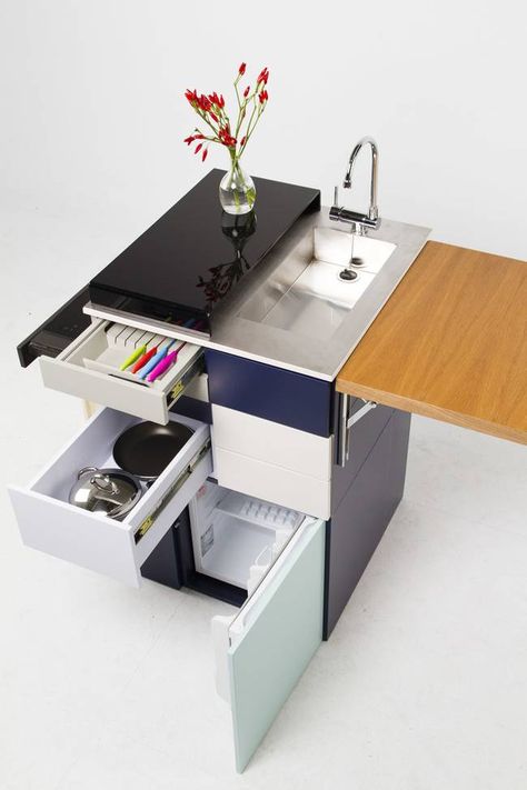 Gali compact kitchen has all the works in the drawers : TreeHugger Compact Kitchen Unit, Guest Kitchen, Micro Kitchen, Portable Furniture, Electrical Stores, Kitchen Unit, Tiny House Storage, Portable Kitchen, Convertible Furniture