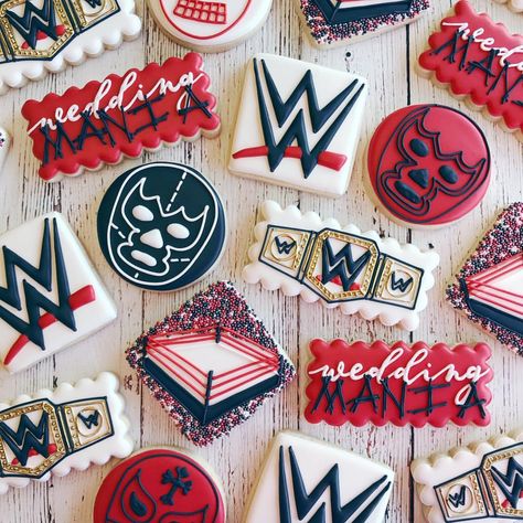 Cadie Grayson on Instagram: “It’s Wedding Mania! #cadiescookies #royalicing #royalicingcookies #wrestling #wrestlingcookies #wwe #weddingmania #wrestlingmania…” Wrestling Themed Wedding, Wwe Cookies Decorated, Wwe Cookies, Wrestling Cookies Decorated, Wrestling Cookies, Wrestling Party Ideas, Wwe Birthday Cakes, Wrestling Birthday Parties, Wrestling Party