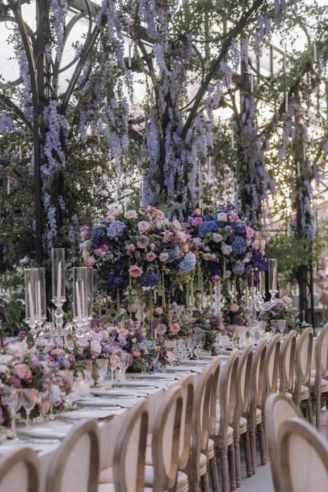 purple flowers, dinner table, wedding dinner, long floral centerpiece, outdoor dinner party, long table Bridgerton Wedding Theme, Outdoor Wedding Dinner, Marriage Aesthetic, Reception Theme, Bridal Era, Asian Wedding Decor, Wedding Motif, Quince Decor, Wisteria Wedding