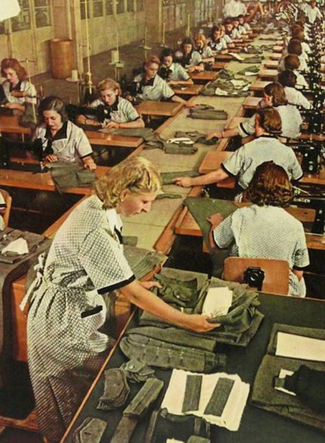 two long rows of women working at sewing machines, sewing gray uniforms Industrial Revolution Fashion, Made In Dagenham, Radium Girls, Blouse Nylon, Sewing Factory, Generation Gap, Bf 109, Textile Factory, German Uniforms