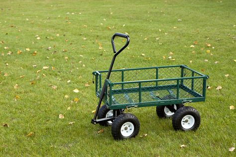 When working in the garden, you’ll inevitably have to carry around tools and supplies or deal with yard waste. Using a garden cart makes the job easier, saving your energy and your back. Garden Tools Diy, Working In The Garden, Garden Wagon, Utility Wagon, Garden Cart, Yard Waste, Garden Tool Storage, Large Garden, Rolling Cart