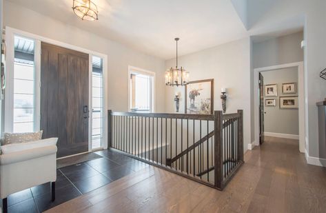 Open Downstairs Staircase, Open Concept Stairs To Basement, Open Basement Stairs In Living Room, Door At Bottom Of Basement Stairs, Stairs By Front Door, Open Stairs To Basement, Open Staircase To Basement, Closed Staircase, Basement Stairway