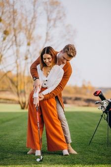 Couple playing golf together Family Golf Pictures, Golf Course Couple Photos, Prewedding Golf Ideas, Golf Course Pre Wedding, Golf Couple Photoshoot, Mini Golf Photoshoot, Golf Couple Goals, Golf Couple Pictures, Golf Prewedding