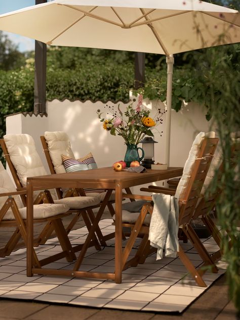 Tips and ideas for decorating your outdoor space - IKEA Wooden Outdoor Furniture, Offset Patio Umbrella, Outdoor Umbrellas, Ultraviolet Radiation, Comfy Living Room, Parasol Base, Garden Cottage, Air Vent, Recliner Chair