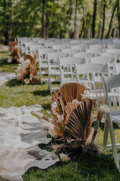 Cowhide rugs make for a cozy & on-trend wedding aisle, indoor or out. #ICYMI, check out our latest blog to get inspired by a boho-luxe event we participated in at Saddle Woods Farm. Wedding Aisle Indoor, Rug Aisle, Dried Wedding Flowers, Boho Backdrop, Reception Bar, Wedding Isles, Luxe Decor, Wedding Arches, Skin Rugs