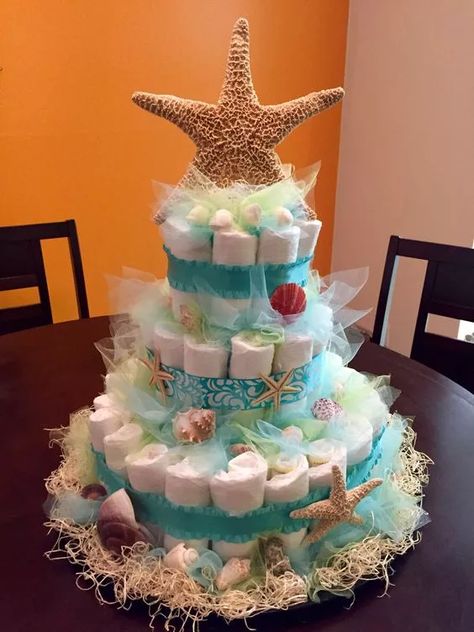 21+ Inspiring Beach Themed Baby Shower Ideas 2022 Ocean Baby Shower Theme, Baby Shower Cake Ideas, Ocean Baby Showers, Beach Baby Showers, Boy Baby Shower Ideas, Sea Baby Shower, Baby Shower Crafts, Baby Shower Diaper Cake, Baby Diaper Cake