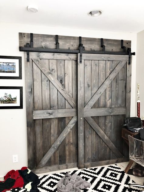 DIY BYPASS CLOSET BARN DOORS FOR $70 EACH USING TONGUE AND GROOVE Diy Kast, Double Sliding Barn Doors, Bypass Barn Door, Barn Door Closet, Diy Sliding Barn Door, Double Barn Doors, Diy Barn Door, Diy Closet, Door Makeover