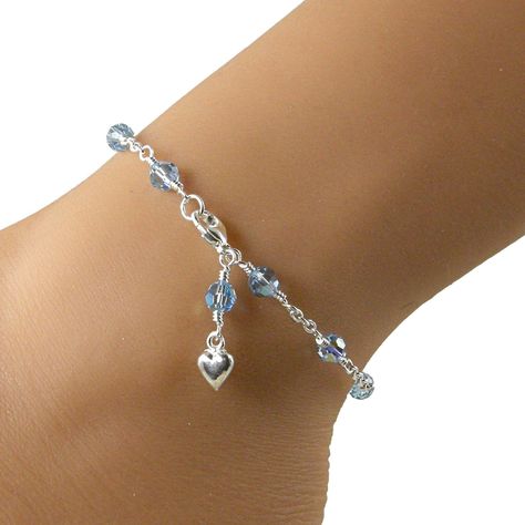 This lovely anklet is the perfect something blue for the bride on her special day. Made with aquamarine AB Swarovski crystals and pretty sterling silver chain, with a dangling sterling silver heart charm. Please choose the size that you need from the drop down menu, bearing in mind that the anklet should be approximately one inch larger than the size of your ankle. The anklet will arrive in an attractive gift box. Pink Anklet, Blue Anklet, Bridal Anklet, Wedding Anklets, Silver Ankle Bracelet, Something Blue Bridal, Crystal Anklet, Ankle Jewelry, Sterling Silver Anklet