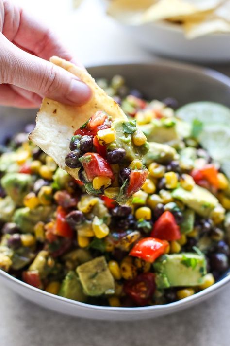 Avocado Corn and Black Bean Salsa - This Avocado Corn and Black Bean Salsa is a fresh, easy, no-cook, and healthy and light dip, appetizer or side dish! Perfect for game day, parties and showers! Vegan, vegetarian, gluten free friendly. #avocado #corn #blackbean #salsa #dip #appetizer #gamedayfood #healthy #light #glutenfree #vegetarian #vegan #recipe #joyousapron Corn And Black Bean Salsa, Avocado Corn Salsa, Warm Weather Recipes, Corn And Black Bean, Black Bean Corn Salsa, Antipasto Pasta Salads, Spicy Baked Chicken, Easy Healthy Meals, Corn Avocado